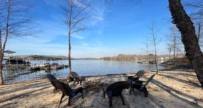 Waterfront home for 12: pets welcome, covered deck, boat slip, beach area, grill