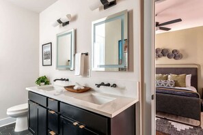 Shower, hair dryer, towels, shampoo