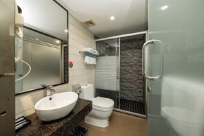 A modern bathroom with a large mirror, white sink, and toilet. - Boli Yiju Hotel (Kai Pingmu Village) (Kaiping)