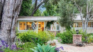 A rustic building with a garden in front, surrounded by trees. - Charming Ranch w/spa, 1/2 acre near Miramar Beach (Montecito)