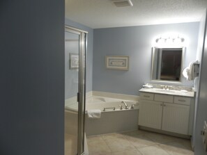 Combined shower/tub, jetted tub