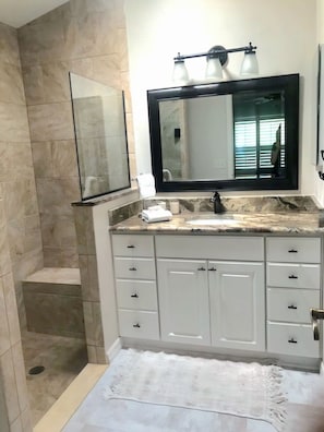 Combined shower/tub, hair dryer, towels, soap
