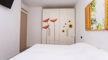 2 habitaciones y ropa de cama