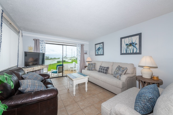 Superior Condo | Living area | 52-inch Smart TV with cable channels, TV