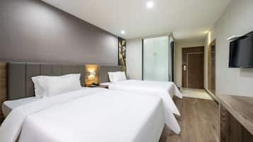 Down comforters, desk, blackout drapes, bed sheets