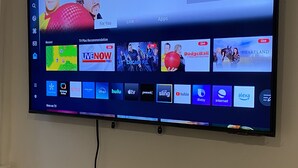 A TV screen displaying a streaming service interface with various live and on-demand content options. - Lovely Basement with 2 Bedrooms and Kitchen (Huntington)