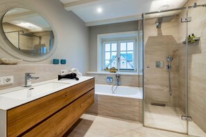 Shower, hair dryer, towels