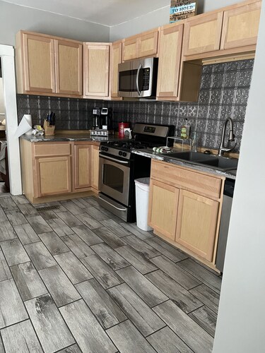 3 Miles to Downtown 3 Bedrooms 2 Full Baths. Kitchen, Dining & Gathering areas.