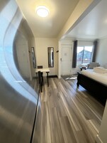 Desk, blackout drapes, soundproofing, free WiFi