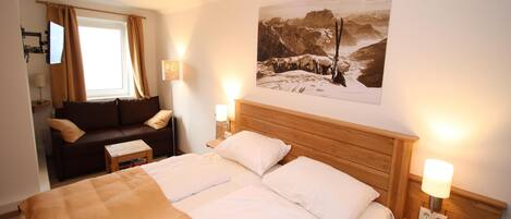 6 slaapkamers, een strijkplank/strijkijzer, internet