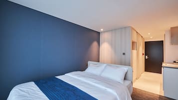 Down comforters, desk, laptop workspace, blackout drapes