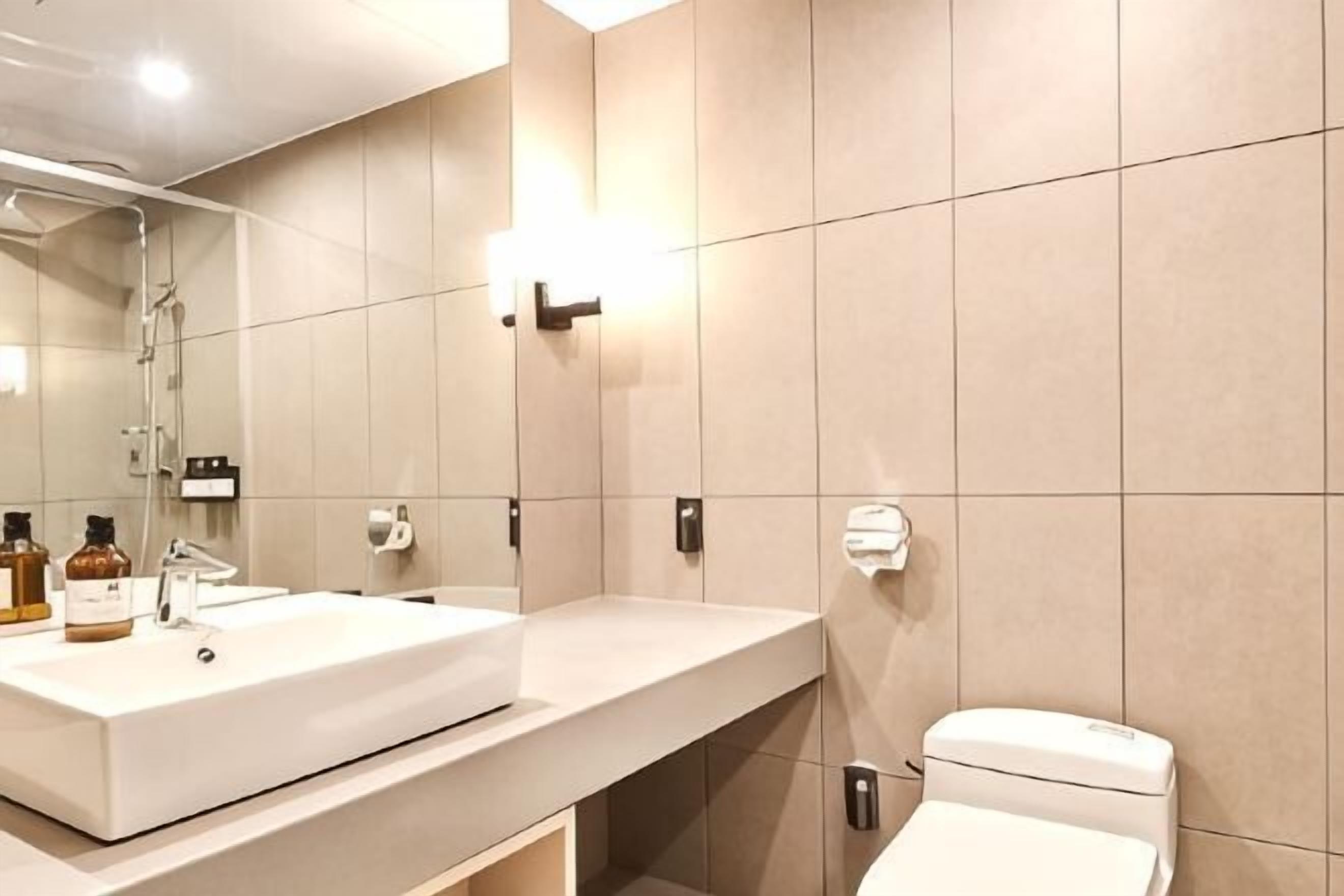 Bathroom | Shower, hair dryer, slippers, towels