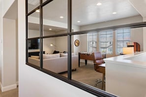 4 bedrooms, laptop workspace, iron/ironing board, cots/infant beds