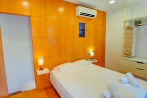 1 chambre, fer et planche à repasser, Wi-Fi gratuit, draps fournis