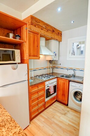 Fridge, microwave, oven, coffee/tea maker - Hermione Apartment by Hello Homes Sitges (Sitges)