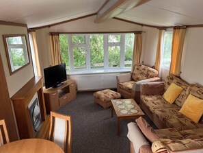 Chalet | Living area | 30-inch TV with cable channels - 2 Bedroom Caravan at Heacham Beach With Decking (King's Lynn)