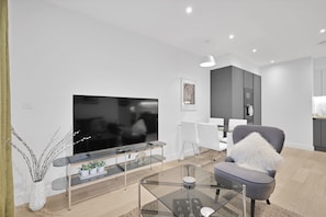 Basic Apartment | Living area | 23-inch Smart TV with digital channels, TV, Netflix - Belmore 1 & 2 Bedroom Luxury Apartment (Stanmore)