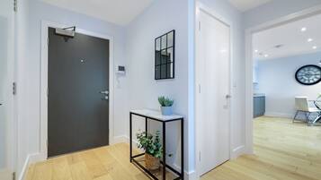 Deluxe Apartment | Living area | 23-inch Smart TV with digital channels, TV, Netflix