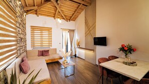 36-inch flat-screen TV with cable channels, TV - Lithoessa Luxury Apartments (Lemnos)