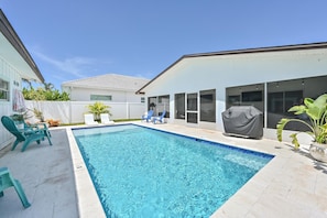 Outdoor pool, a heated pool - Walk to Beach Remodeled home, heated Pool w/ bonus Cabana Oasis! Free Bikes  (Naples)
