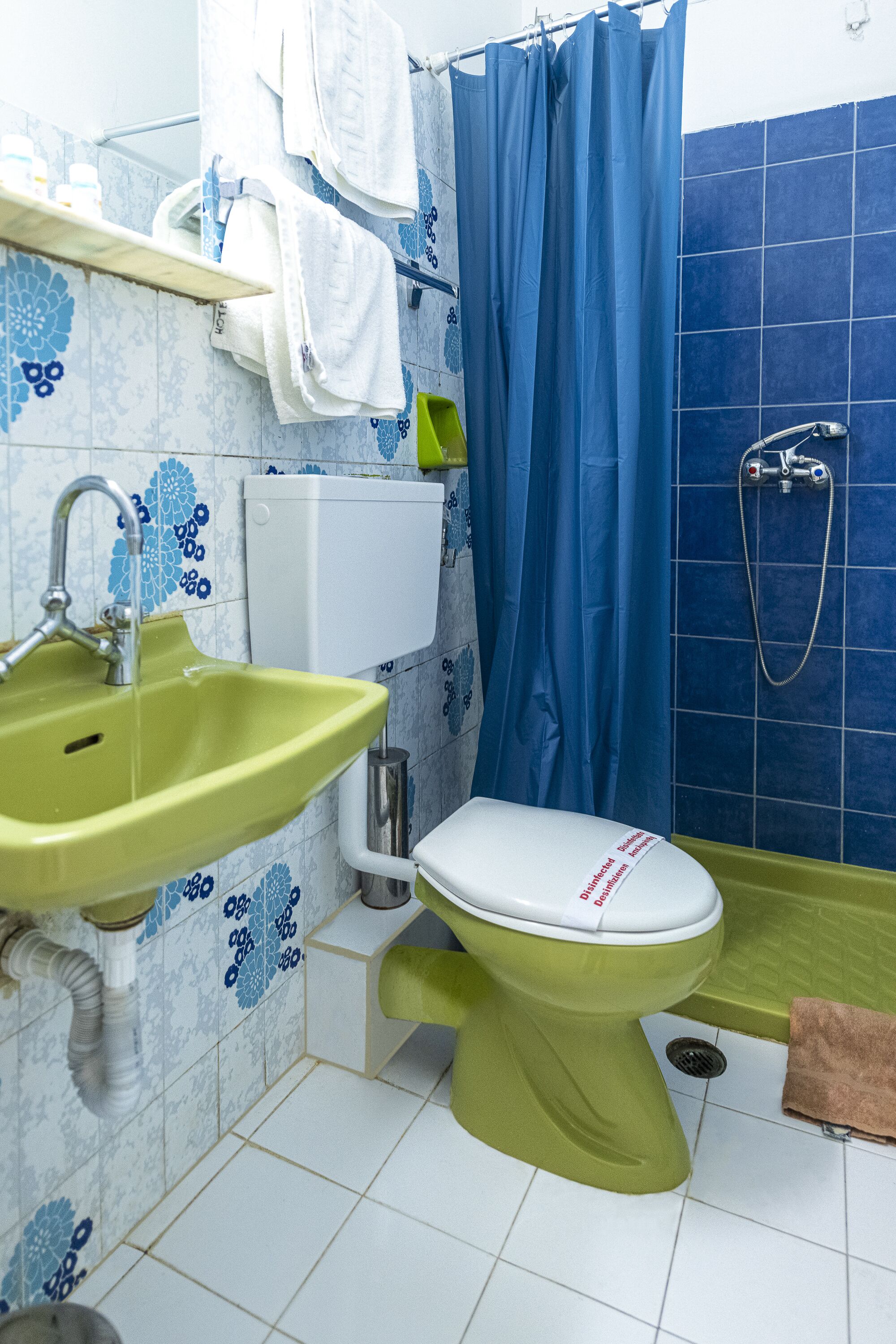standard quadruple room | bathroom | shower, hair dryer, towels, soap
