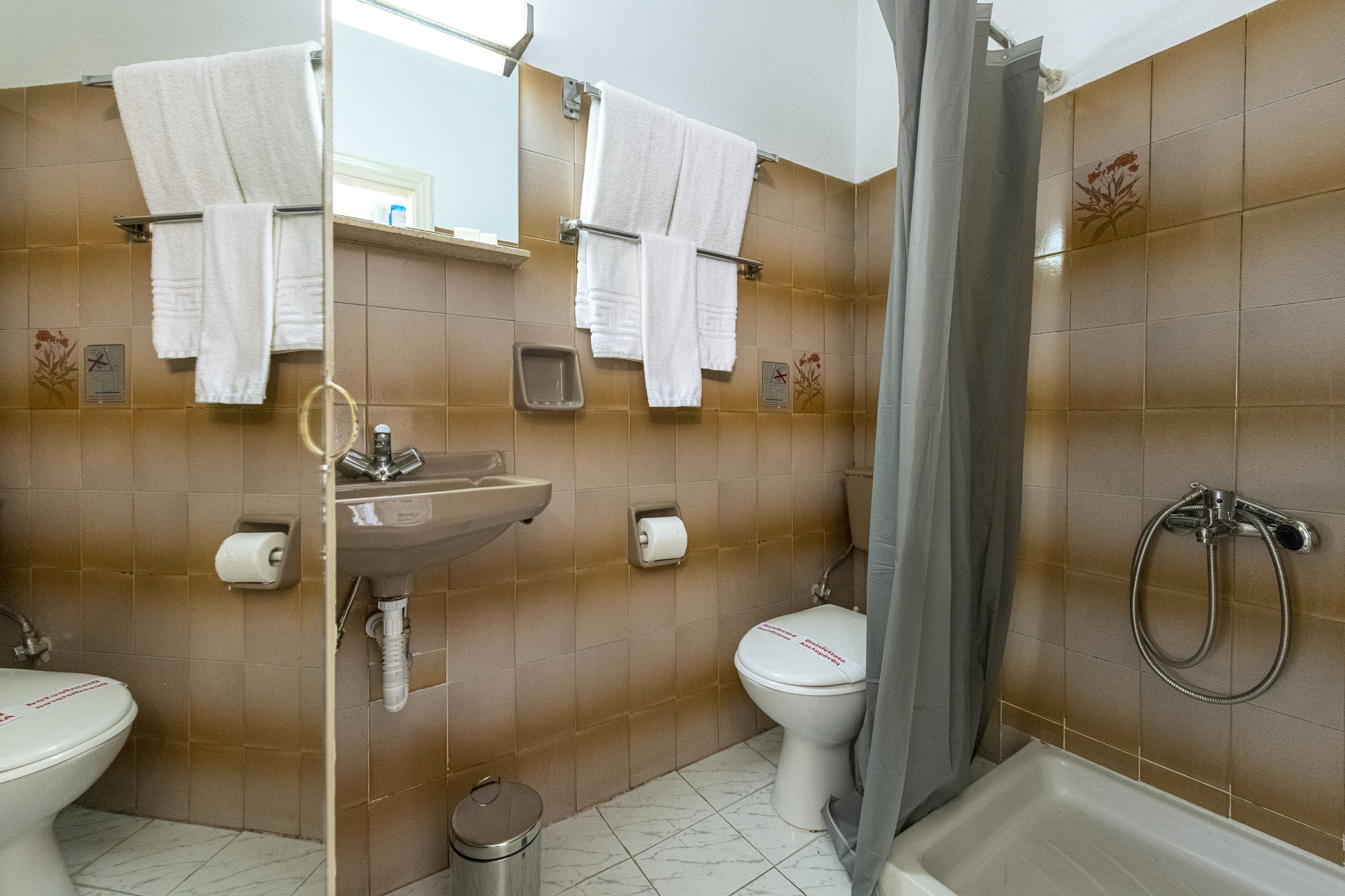 standard triple room | bathroom | shower, hair dryer, towels, soap