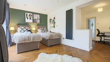 4 bedrooms, desk, iron/ironing board, travel cot