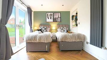 4 bedrooms, desk, iron/ironing board, travel cot