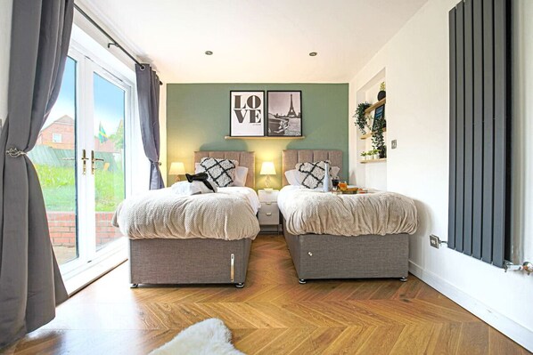 4 bedrooms, desk, iron/ironing board, travel cot