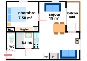 Efficiently designed room with a bedroom, living area, balcony, bathroom, kitchen, and small refrigerator.