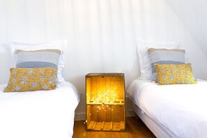 4 عدّة غرف نوم ومكواة/لوح كي وواي فاي مجانًا وملاءات أسرّة