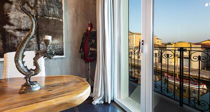 Superior room with balcony overlooking the canal port of Cesenatico