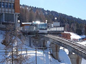 Train station with clear views of the tracks and sleek, modern architecture.