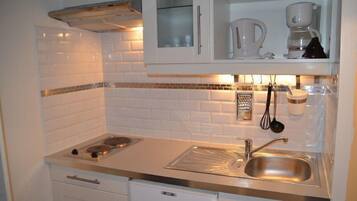 Fridge, microwave, coffee/tea maker, toaster