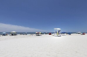 Enjoy beach activities with safety supervision and shade.