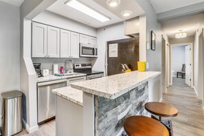 Fridge, microwave, dishwasher, coffee/tea maker