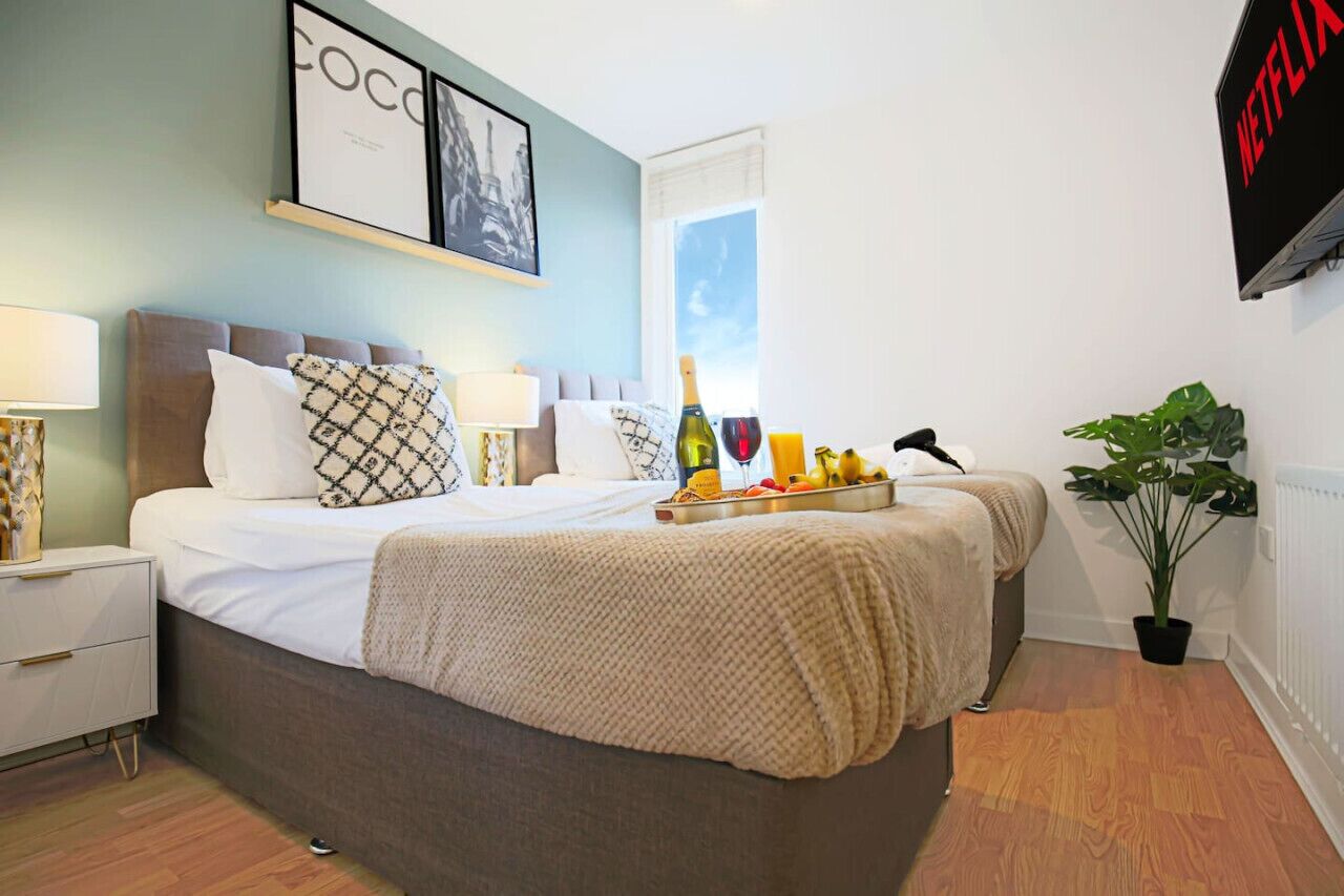 1 bedroom, desk, iron/ironing board, travel crib