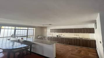 Microwave, dishwasher, dining tables, kitchen islands