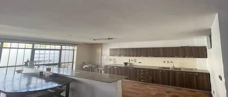 Microwave, dishwasher, dining tables, kitchen islands