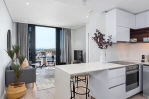 Grand Apartment | Private kitchen | Toaster, cookware/dishes/utensils, dining tables - 16 on Bree Luxury Apartments (Cape Town)