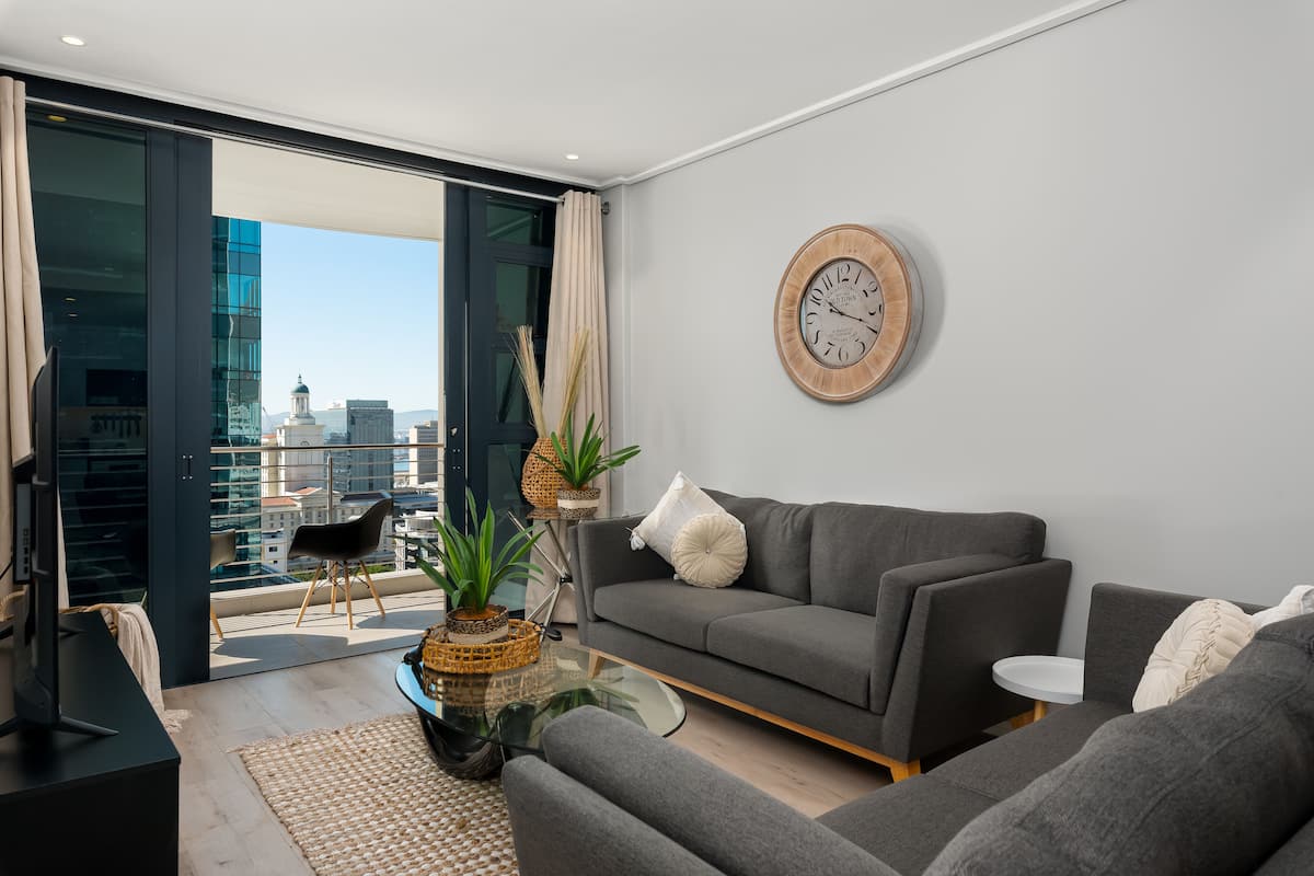 Classic Apartment | Living area | 32-inch flat-screen TV with satellite channels, Netflix