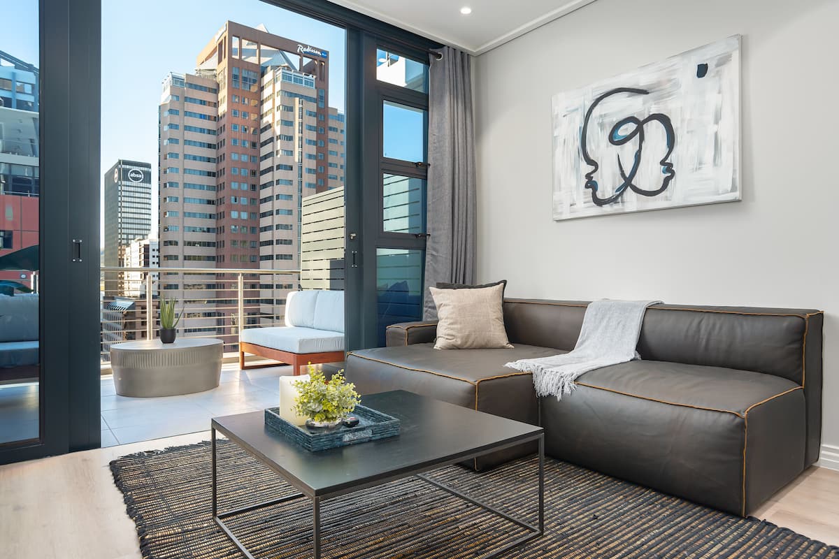 Premium Studio | Living area | 32-inch flat-screen TV with satellite channels, Netflix