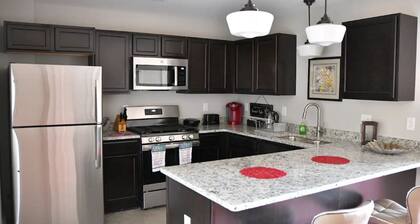 AT YOUR SERVICE! Downtown Aurora 1 Bedroom River Facing Gem