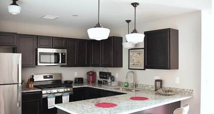 AT YOUR SERVICE! Downtown Aurora 1 Bedroom River Facing Gem