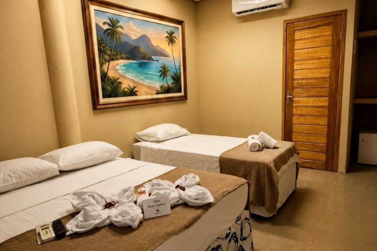 Standard Triple Room | Minibar, soundproofing, iron/ironing board (on request), free WiFi