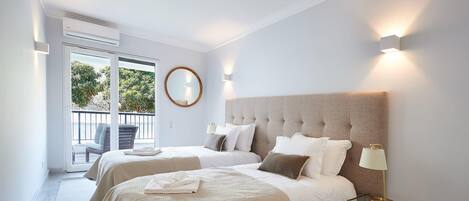 3 عدّة غرف نوم ومكواة/لوح كي وواي فاي وملاءات أسرّة