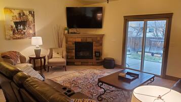 Smart TV, fireplace, DVD player, books