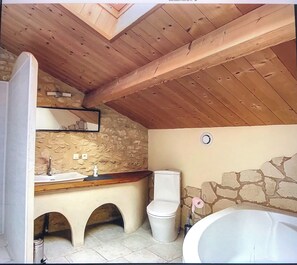 Combined shower/tub, hair dryer, towels, soap