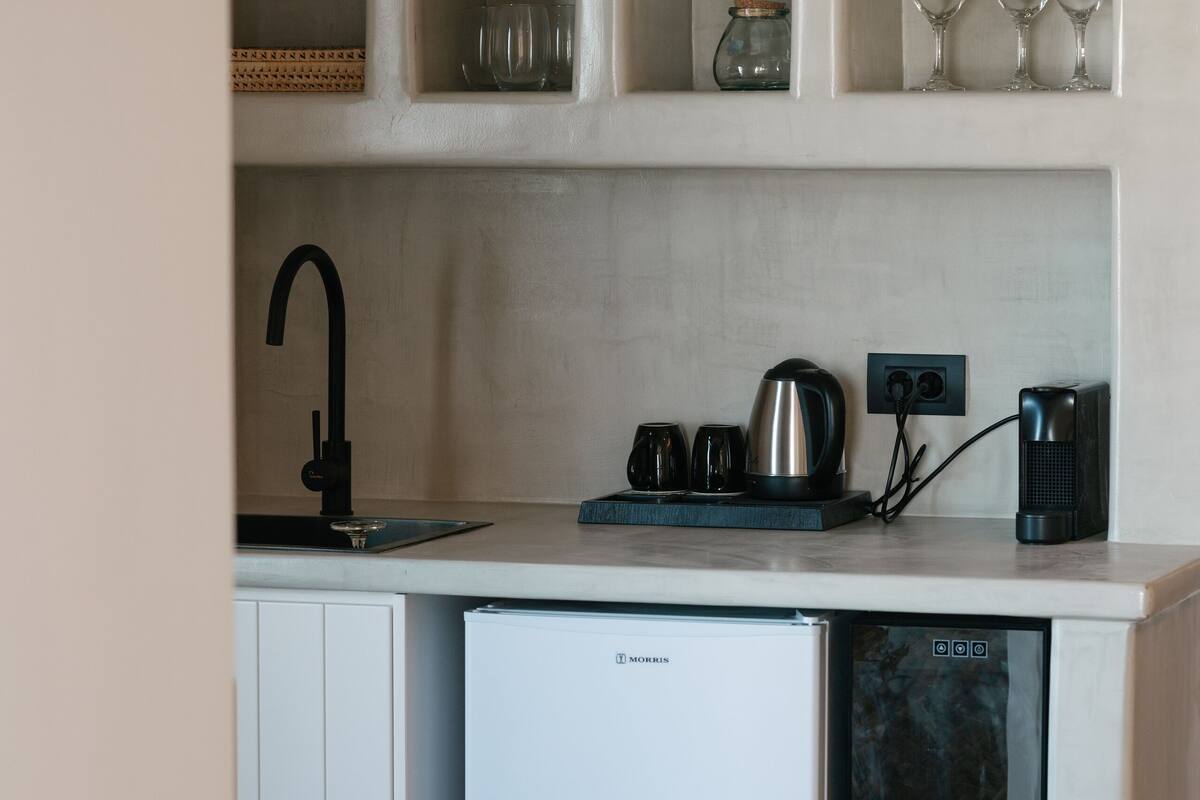 superior suite with outdoor hot tub & village view | 1 bedroom, minibar, in-room safe, individually decorated