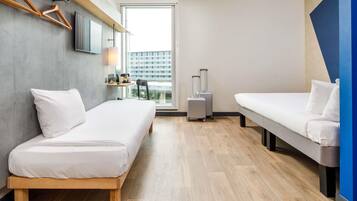Hypo-allergenic bedding, memory-foam beds, desk, laptop workspace